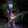 Nain de jardin avec lampadaire